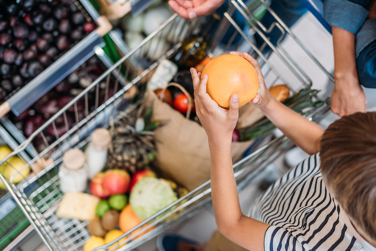 Grocery Shopping with Kids: The Age-by-Age Guide That Actually Works (Tantrums and All)